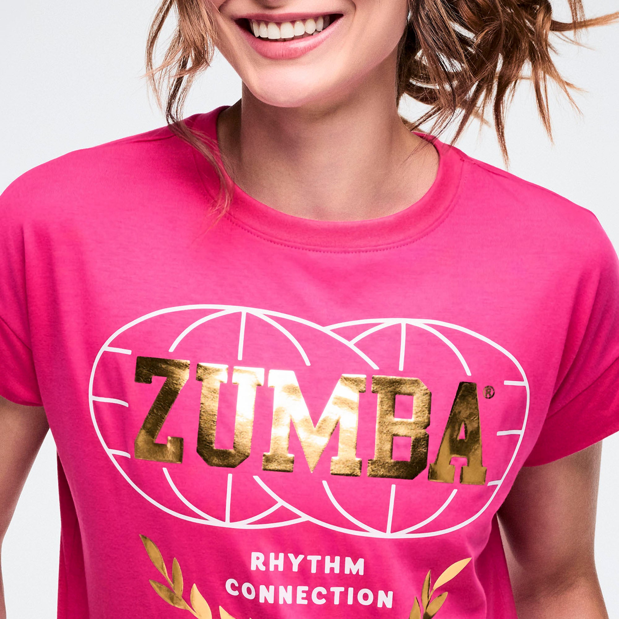 Różowy t-shirt ze złotym logo