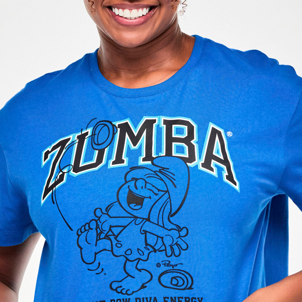 Niebieska koszulka crop ze Smerfem – detal nadruku ZUMBA i Smerfa | Zumba Wear