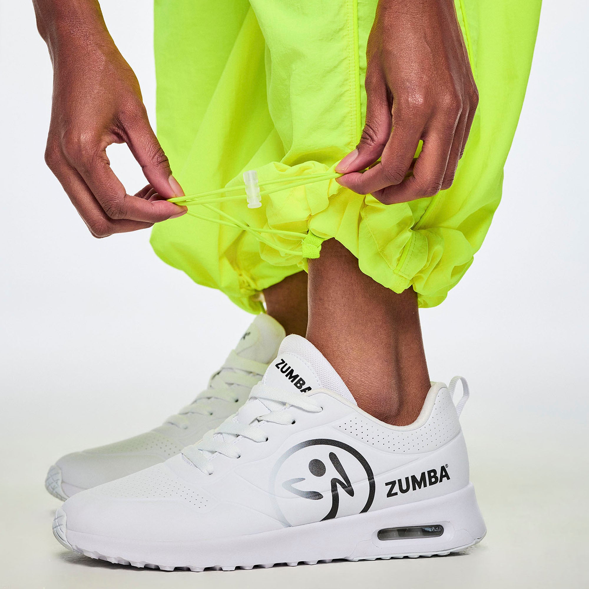 Fluo spodnie z regulacją nogawek
