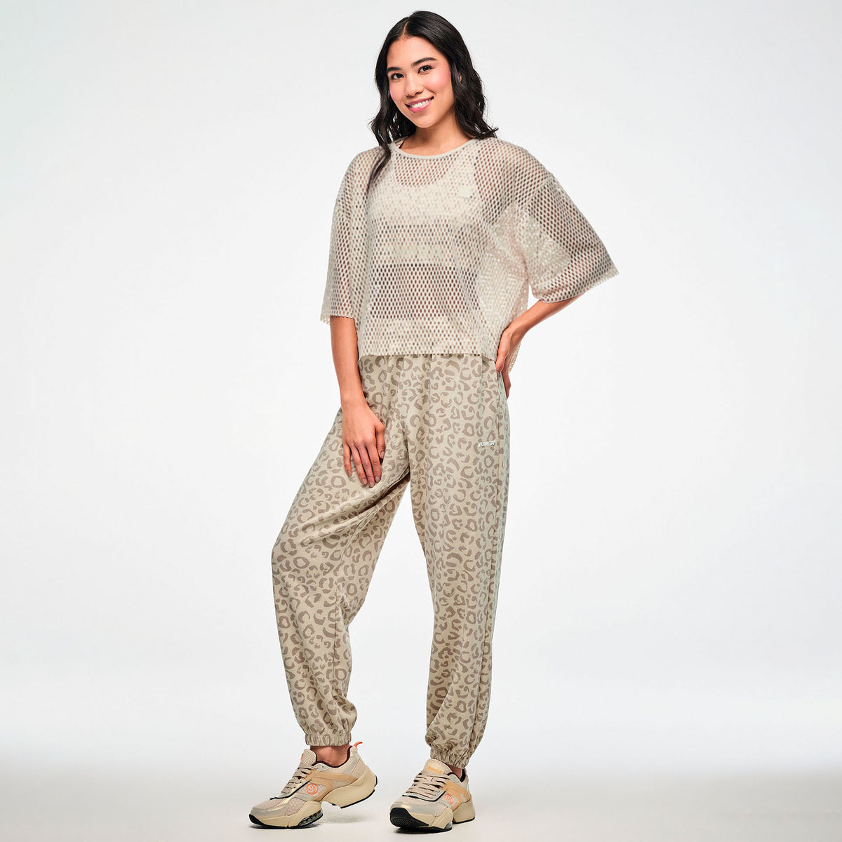 Beżowy krótki top z siateczki — Zumba Wear FW26 Modal